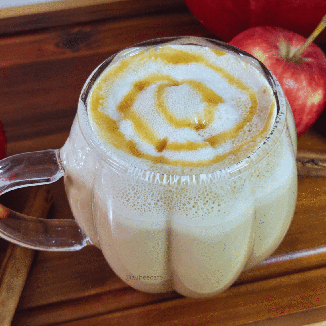 Apple Pie Latte with creamy foam and caramel drizzle