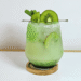 Kiwi Yakult Drink garnished with kiwi slices and mint leaves