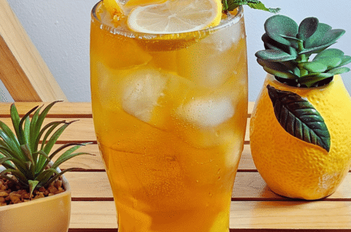 Sparkling Peach Honey Iced Tea with lemon slice and peach slices