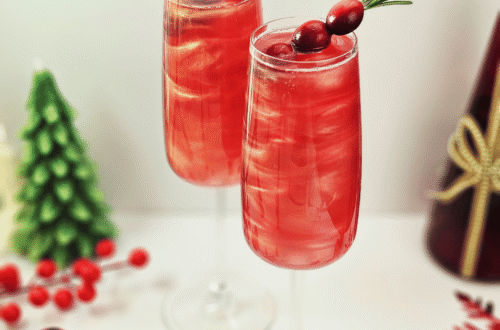 Sparkling Cranberry Mocktail with cranberry and rosemary garnish